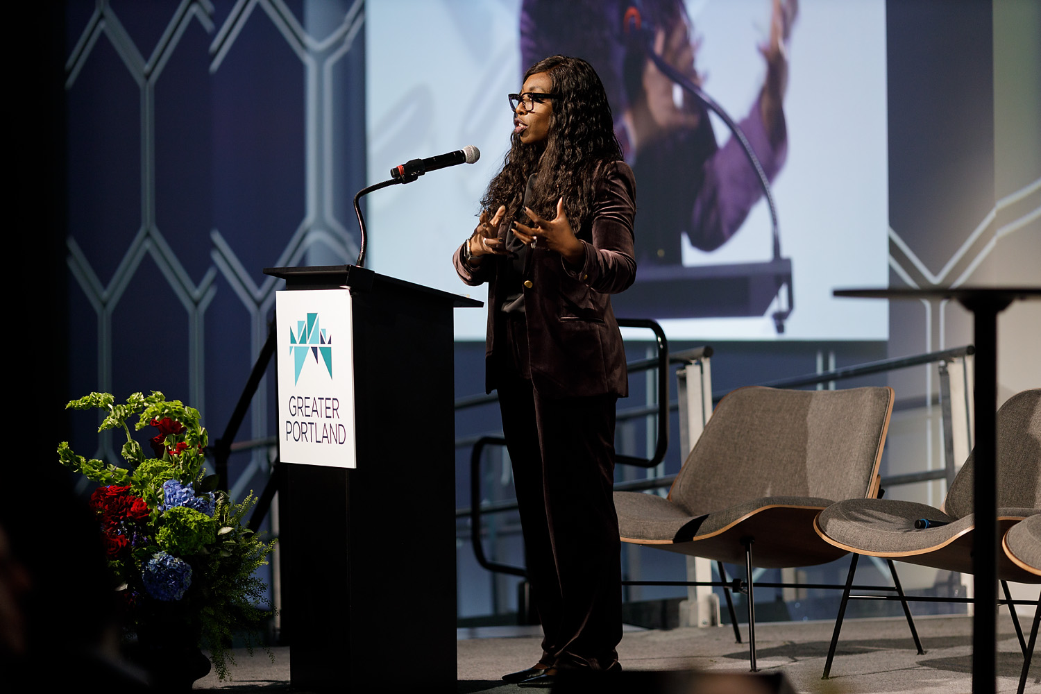 Aphriekah Duhaney-West, Regional Chief Operating Officer for Kaiser Permanente speaking on stage at GPI's 2026 Economic Summit