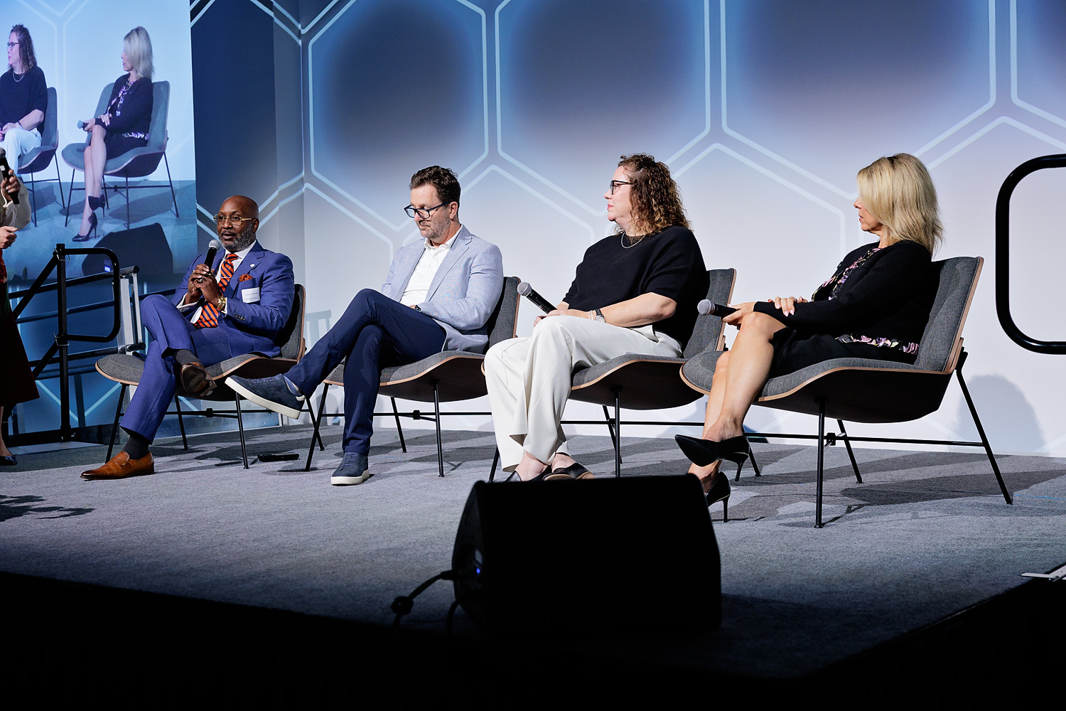 Panelists sitting on stage at GPI's 2026 Economic Summit